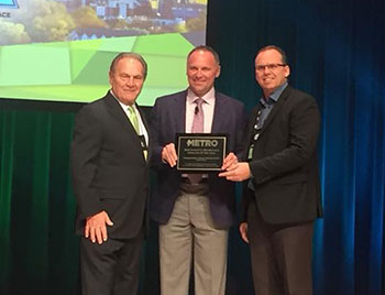 Transportation Charter Services, Terry and Kevin Fischer, accepting Innovative Operator of the Year Award